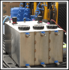 A large metal box with blue and yellow valves.